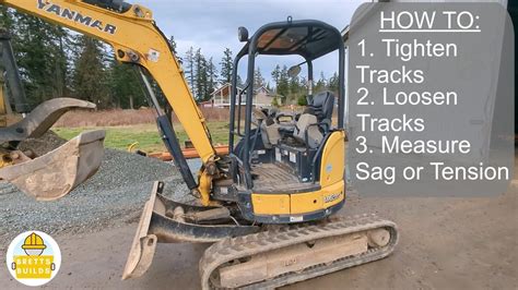 how to put tracks back on a mini digger|track tension for mini excavators.